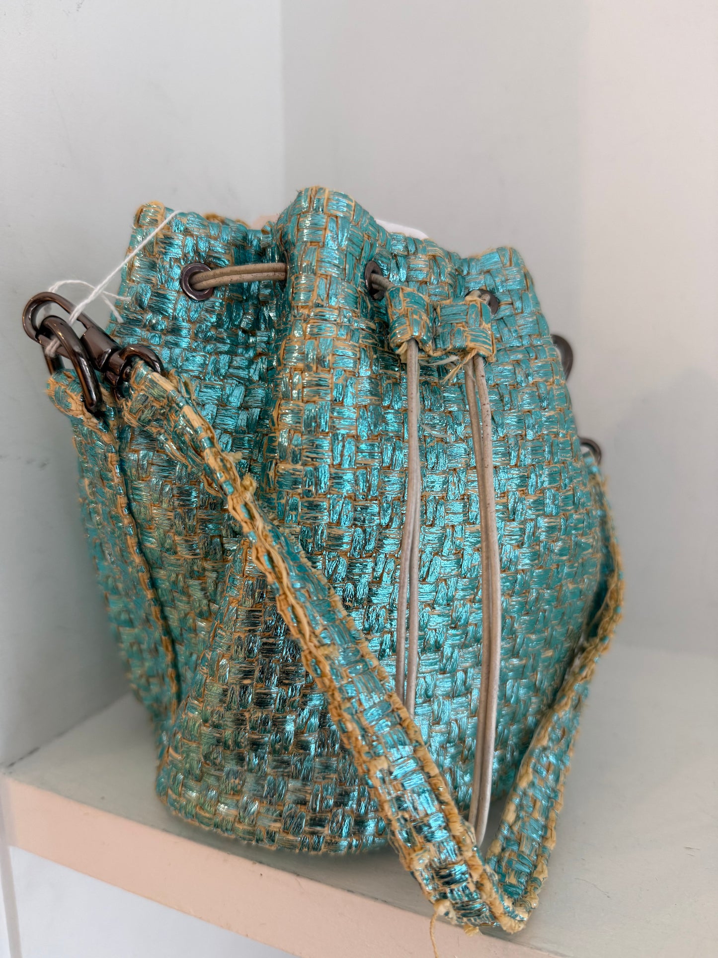 
                  
                    MARIA LA ROSA Metallic straw pouch bag
                  
                